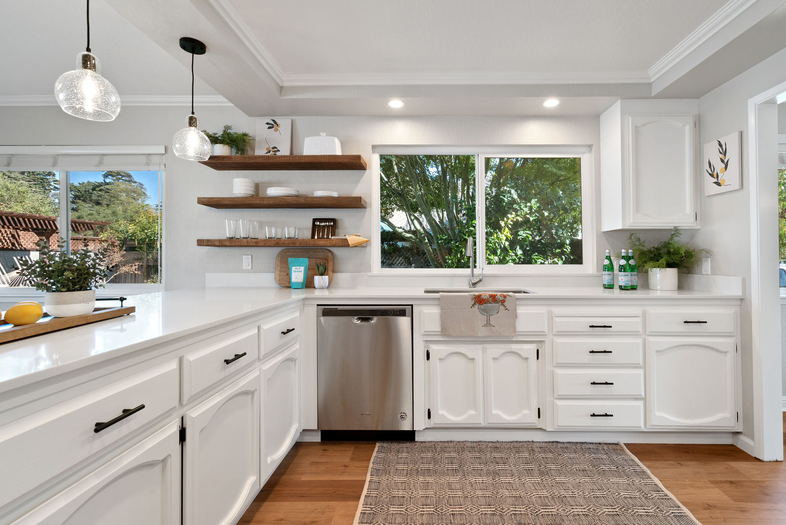 Farmhouse kitchen with white cabinets and countertops